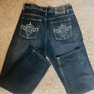 Jean Station- Faded vintage denim with grunge/emo pattern on back pockets.
